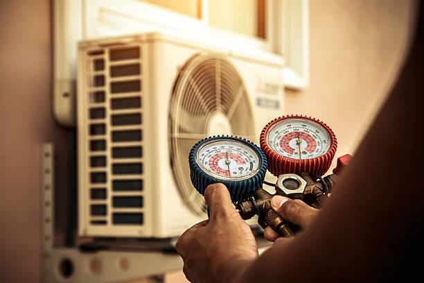 Professional Hvac technician working in Dorchester Center, MA